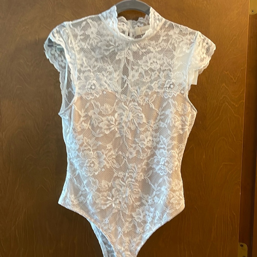 Never worn! Lace Short Sleeve Bodysuit.